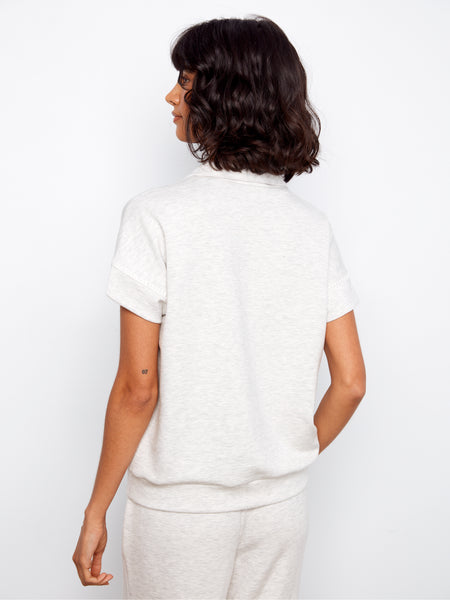 CHARLIE B C1445 SHORT SLEEVE HALF ZIP COLLAR TOP WITH BLANKET STITCH